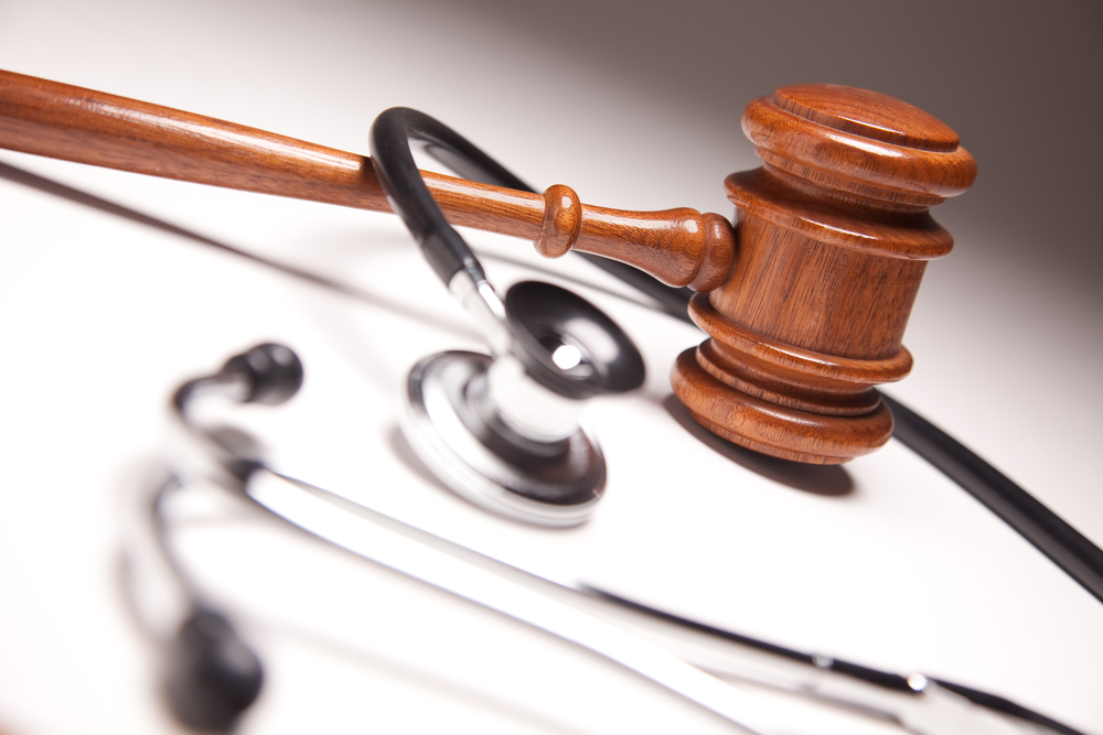 medical malpractice lawyer Orlando- scope and wooden gavel