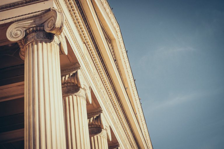 Advantages Of Hiring A Lawyer - stone courthouse facade